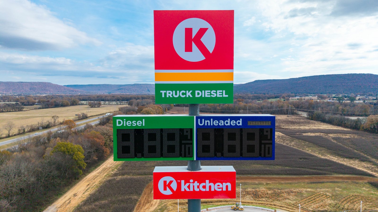 aerial photo of circle k pylon sign directly in front of it over 100 feet above ground